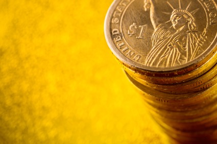 Stack of U.S. gold one dollar coins.